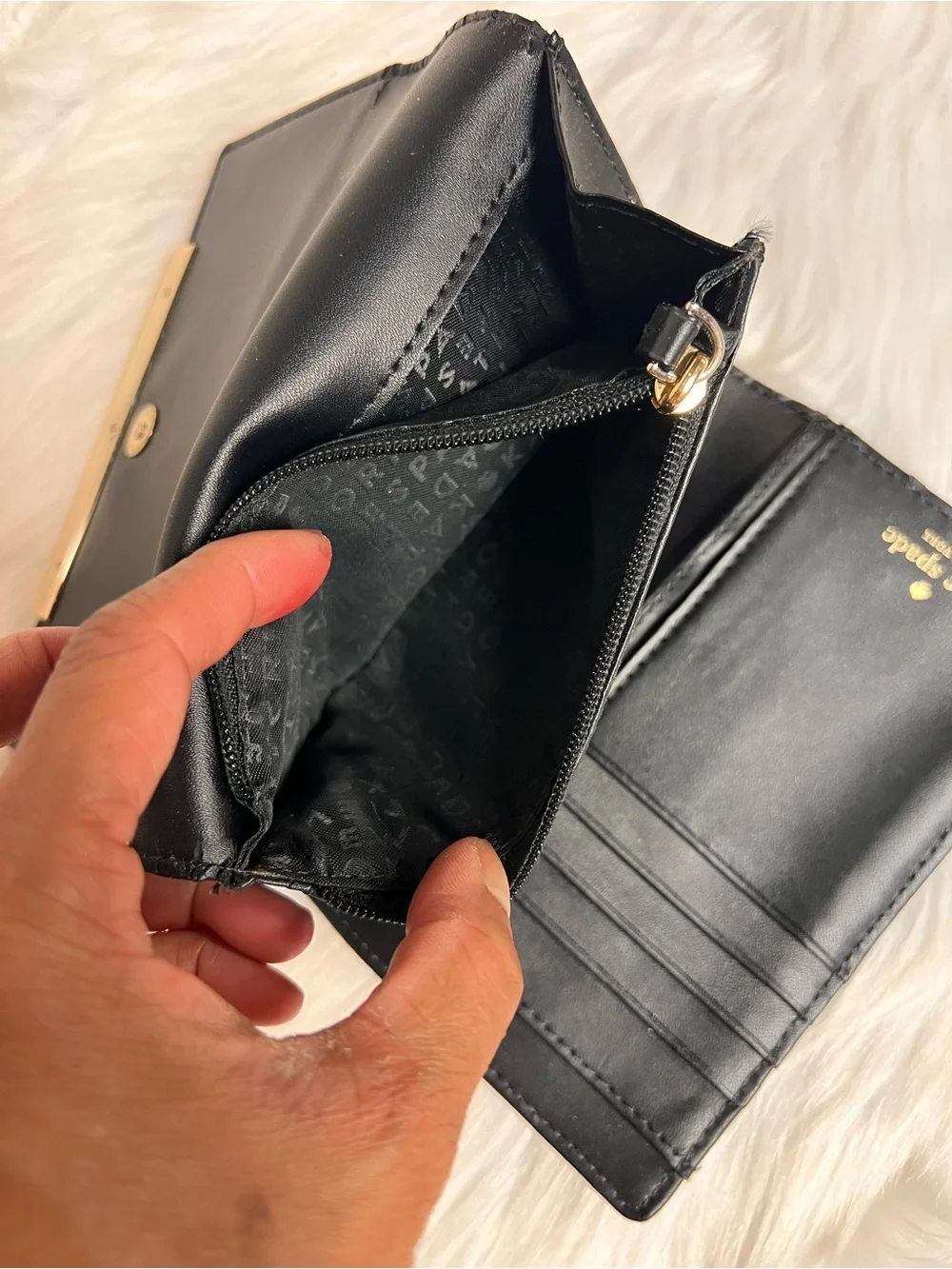 kate spade Black Leather Wallet with Gold Bar Accent
